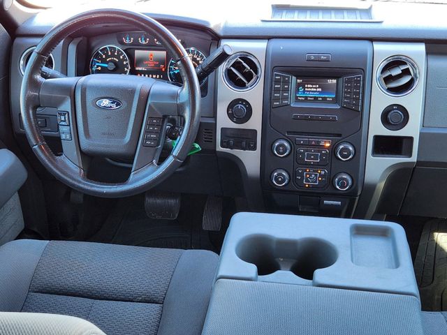 2014 Tuxedo Black Metallic Ford F-150 XLT 4X4 Truck