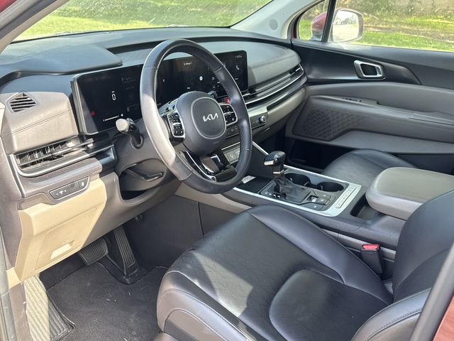 2025 Kia Carnival LXS Red at Shottenkirk Kia Fort Bend