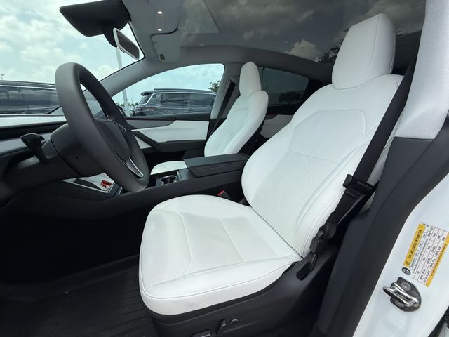 2026 Tesla Model Y Long Range White at AutoSavvy Houston Northwest