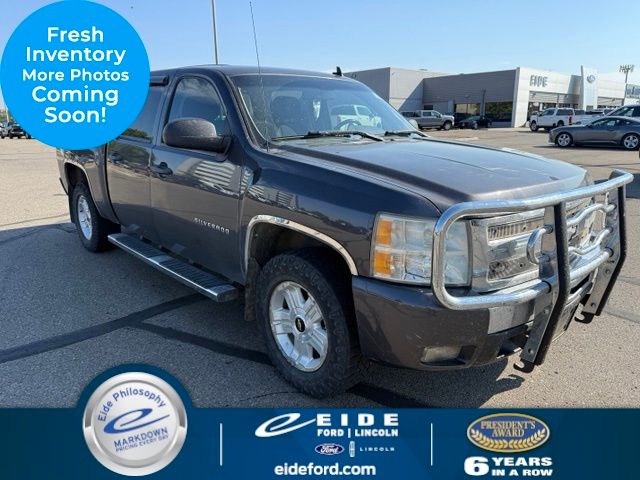 Taupe Gray Metallic 2011 Chevrolet Silverado 1500 Pickup Truck Four-Wheel Drive 6-Speed Automatic