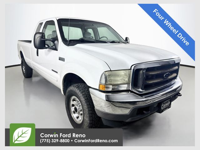 White 2002 Ford F-250 Super Duty Pickup Truck Four-Wheel Drive 4-Speed Automatic