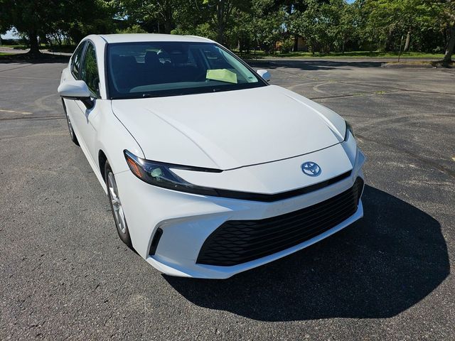 2025 Toyota Camry LE White at Classic Elite Chevrolet Sugar Land