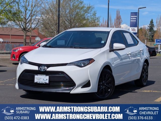 Super White 2019 Toyota Corolla LE Sedan Front-Wheel Drive Continuously Variable Transmission