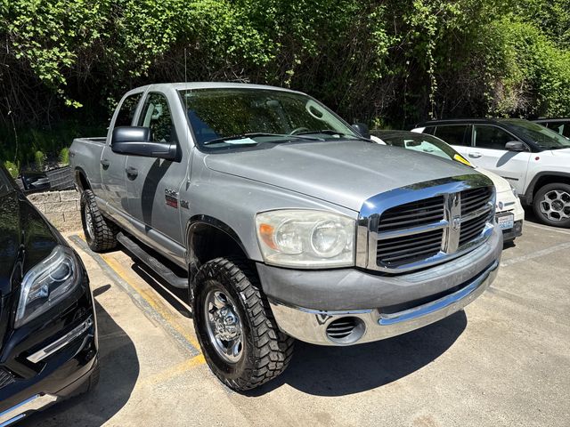 Bright Silver Metallic 2009 Dodge RAM 2500 ST Quad Cab 4WD Pickup Truck Four-Wheel Drive 5-Speed Automatic