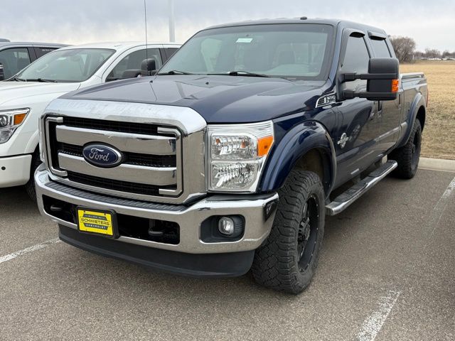 Dark Blue Pearl Metallic 2012 Ford F-250 Super Duty Lariat Crew Cab 4WD Pickup Truck Four-Wheel Drive 6-Speed Automatic Overdrive