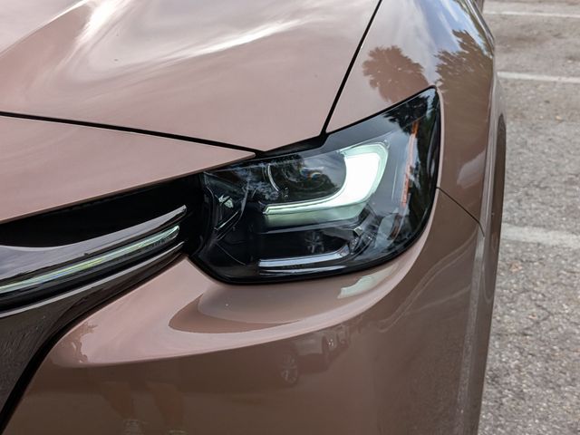 New Melting Copper Metallic 2026 Mazda 3.3 Turbo S Premium AWD for