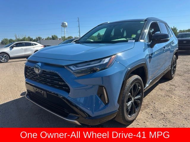 Cavalry Blue/Midnight Black Metallic 2024 Toyota RAV4 Hybrid SUV / Crossover All-Wheel Drive Continuously Variable Transmission