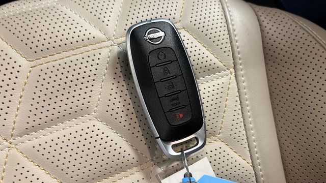 Used 2025 Coulis Red Pearl Nissan Platinum Reserve image 46