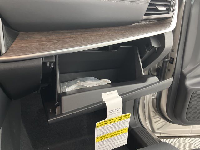 2025 Champagne Silver Metallic/Super Black Nissan Rogue Platinum FWD SUV