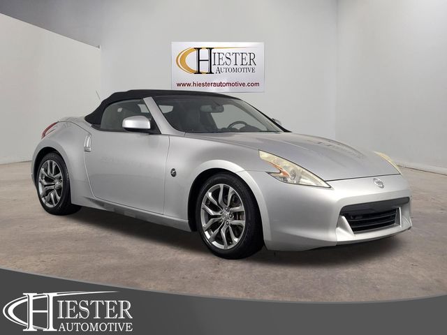 Brilliant Silver Metallic 2011 Nissan 370Z Roadster Touring Convertible Rear-Wheel Drive 7-Speed Automatic