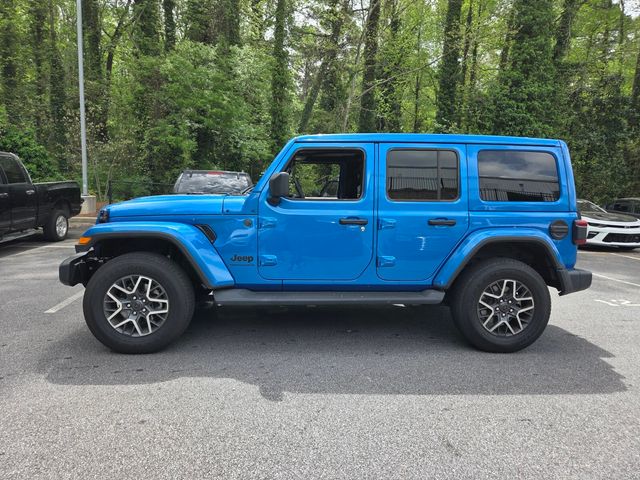 Used 2025 Blue Jeep Sahara image 4