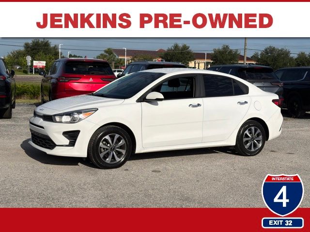 Clear White 2023 Kia Rio Sedan Front-Wheel Drive Continuously Variable Transmission