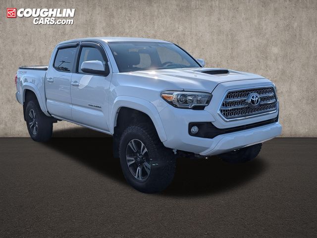 Super White 2016 Toyota Tacoma Pickup Truck Four-Wheel Drive 6-Speed Manual