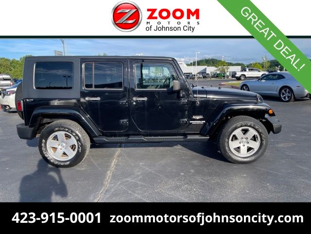 Black Clearcoat 2010 Jeep Wrangler Unlimited Sahara 4WD SUV / Crossover Four-Wheel Drive 6-Speed Manual