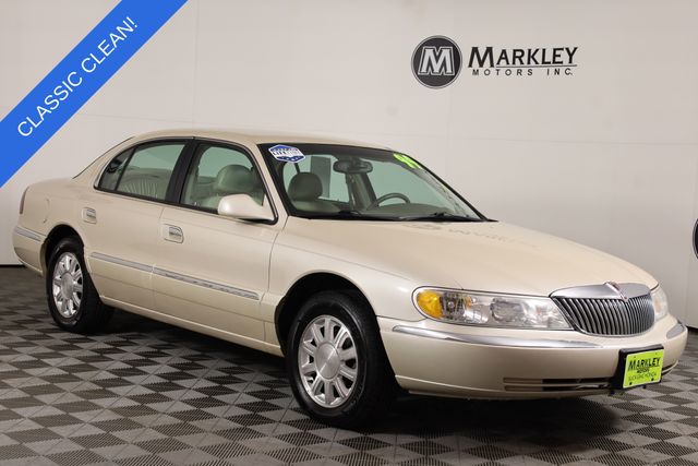 Brown (Tan) 1999 Lincoln Continental FWD Sedan Front-Wheel Drive 4-Speed Automatic Overdrive