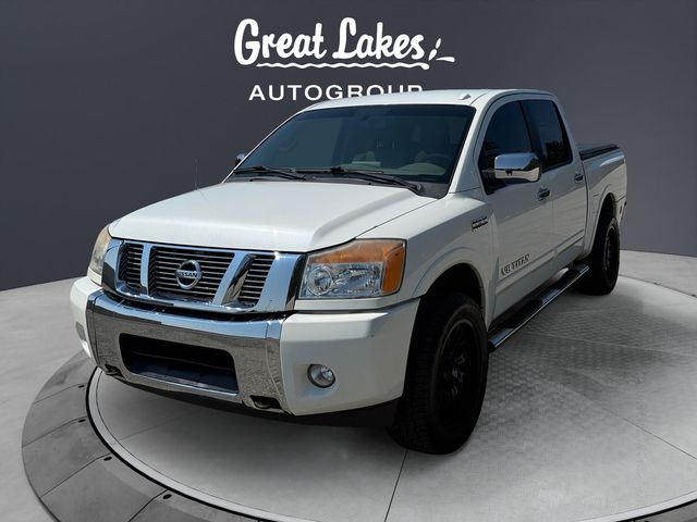 Pearl White Metallic 2014 Nissan Titan Pickup Truck Four-Wheel Drive 5-Speed Automatic