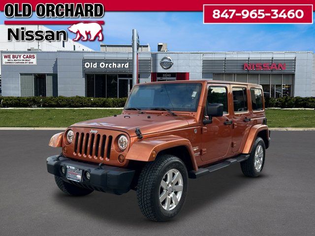 Orange (Mango Tango Pearlcoat) 2011 Jeep Wrangler SUV / Crossover Four-Wheel Drive 6-Speed Manual