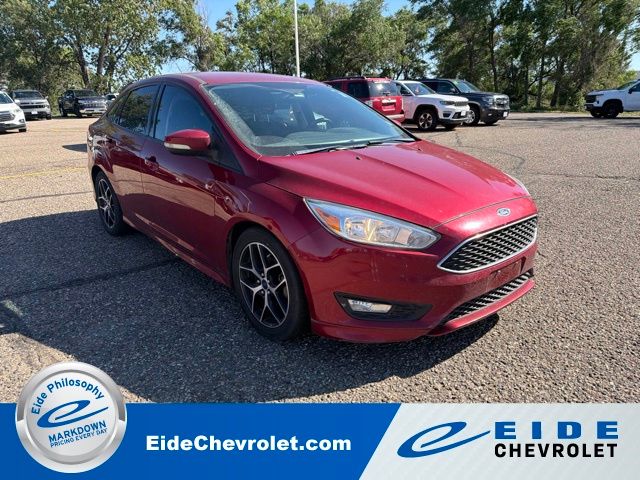 Ruby Red Metallic 2015 Ford Focus Sedan Front-Wheel Drive 6-Speed Automatic