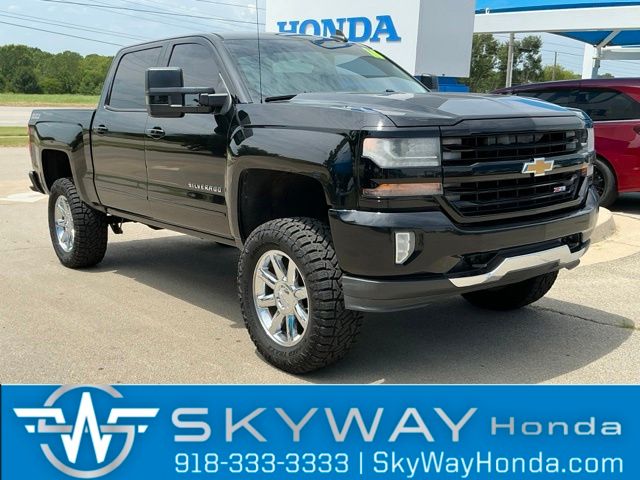 Black 2016 Chevrolet Silverado 1500 Pickup Truck Four-Wheel Drive 6-Speed Automatic Overdrive