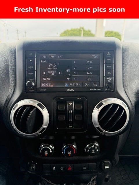 2013 Jeep Wrangler Unlimited Sahara Silver at DeMontrond Auto Country