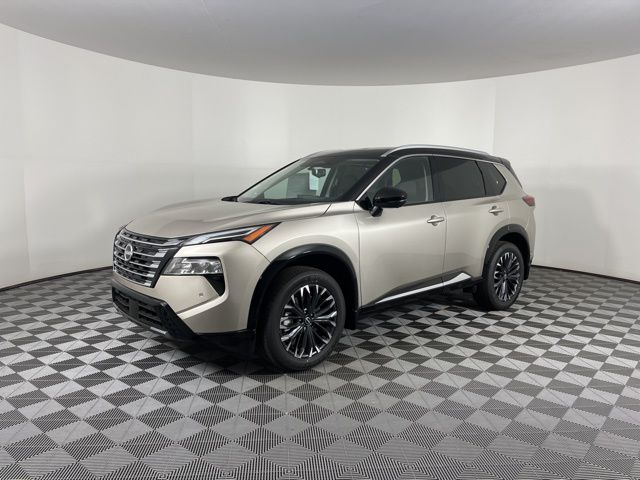 2025 Champagne Silver Metallic/Super Black Nissan Rogue Platinum FWD SUV