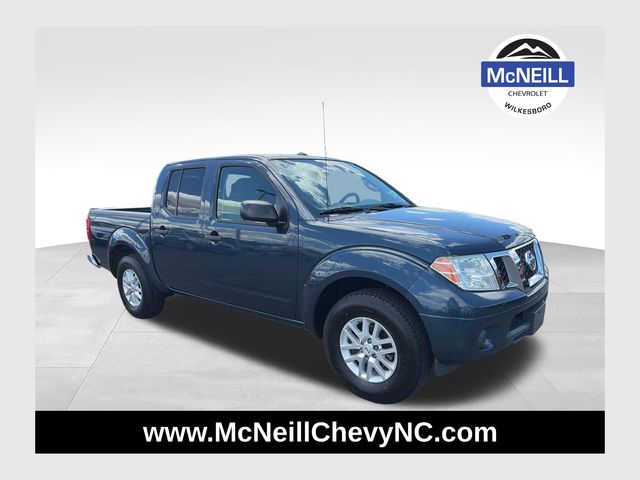 Arctic Blue Metallic 2016 Nissan Frontier SV Crew Cab Pickup Truck 4X2 5-Speed Automatic Overdrive