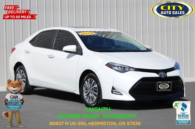 White (Blizzard Pearl) 2019 Toyota Corolla XLE Sedan Front-Wheel Drive Continuously Variable Transmission