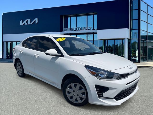 Clear White 2023 Kia Rio Sedan Front-Wheel Drive Continuously Variable Transmission