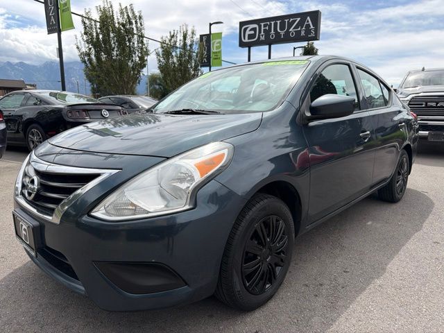 Blue 2016 Nissan Versa Sedan Front-Wheel Drive 5-Speed Manual