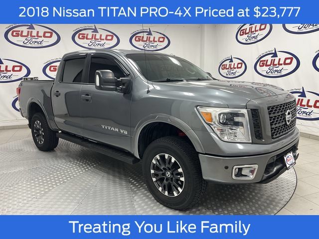 Gray (Gun Metallic) 2018 Nissan Titan Pickup Truck Four-Wheel Drive 7-Speed Automatic