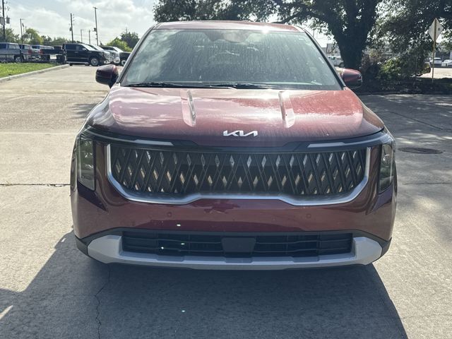 2025 Kia Carnival LXS Red at Shottenkirk Kia Fort Bend