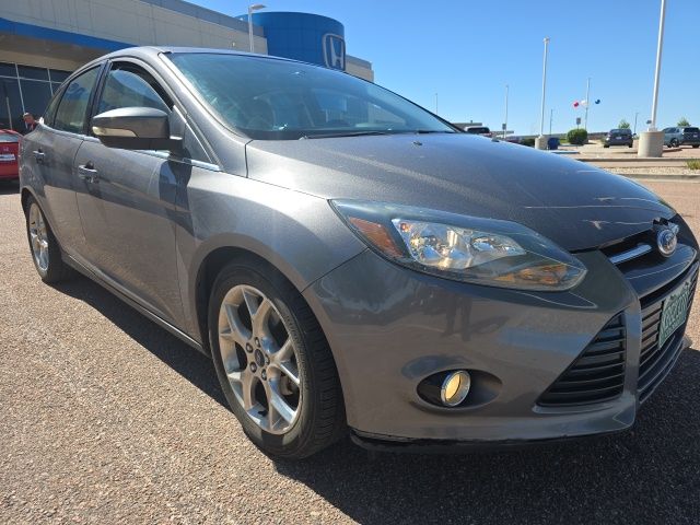 Sterling Gray Metallic 2014 Ford Focus Titanium Sedan Front-Wheel Drive 6-Speed Automatic