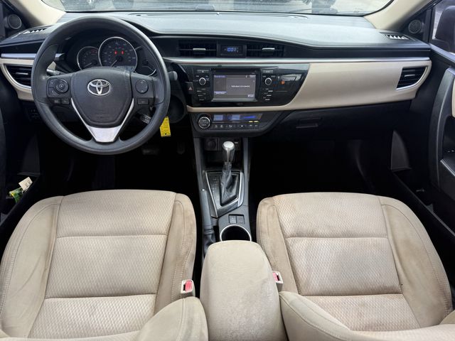2015 Toyota Corolla LE Brown at Texan Dodge Chrysler Jeep Ram