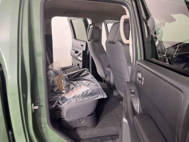 2025 Tactical Green Metallic Nissan Frontier SV RWD Truck