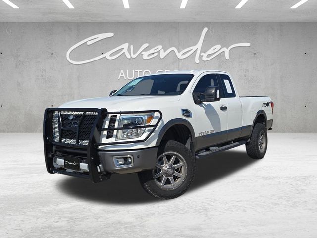 Pearl White 2017 Nissan Titan Pickup Truck Four-Wheel Drive 6-Speed Automatic