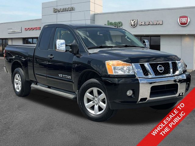 Galaxy Black Metallic 2014 Nissan Titan Pickup Truck Four-Wheel Drive 5-Speed Automatic