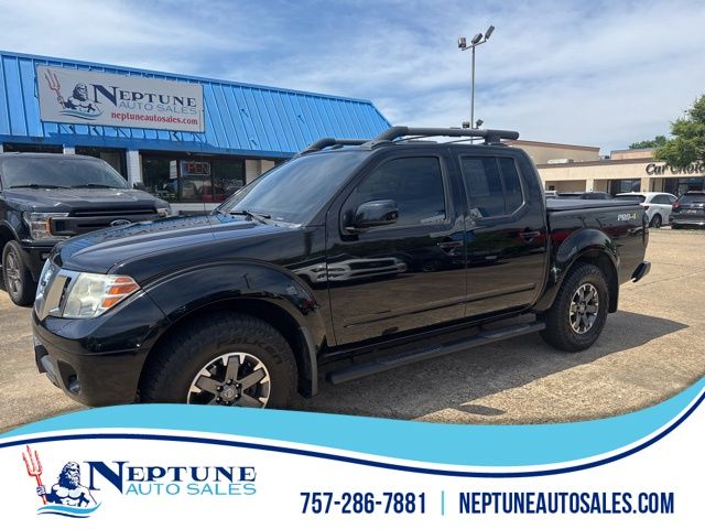 Super Black 2014 Nissan Frontier Pickup Truck Four-Wheel Drive 5-Speed Automatic Overdrive