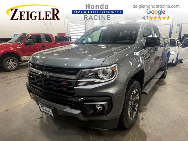 View vehicle photo 3