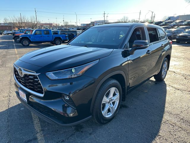 Used 2023 Toyota Highlander LE with VIN 5TDKDRBHXPS006013 for sale in Kansas City