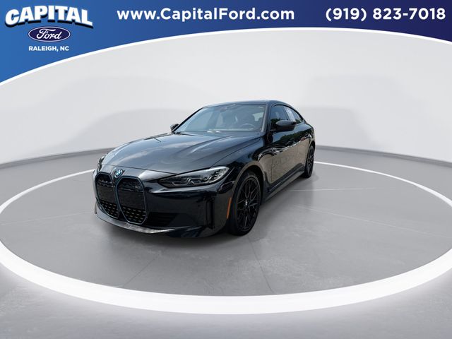 Used 2023 Black Sapphire Metallic BMW eDrive40 image 4