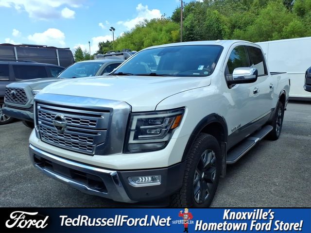 Pearl White 2021 Nissan Titan Pickup Truck Four-Wheel Drive 9-Speed Automatic