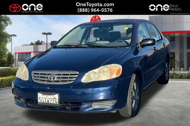Blue 2004 Toyota Corolla LE Sedan Front-Wheel Drive 4-Speed Automatic Overdrive