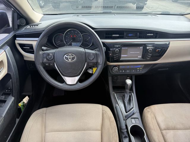 2015 Toyota Corolla LE Brown at Texan Dodge Chrysler Jeep Ram