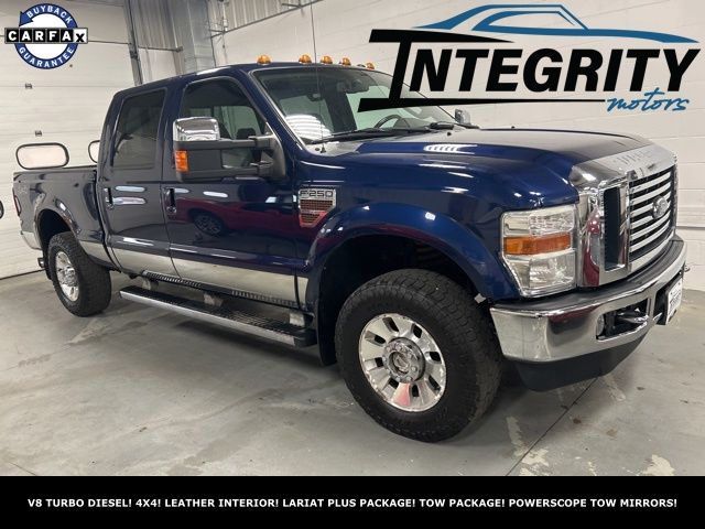 Dark Blue Pearl 2010 Ford F-250 Super Duty Lariat Crew Cab 4WD Pickup Truck Four-Wheel Drive 6-Speed Manual Overdrive