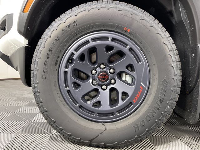 2025 Glacier White Nissan Frontier PRO-X RWD Truck