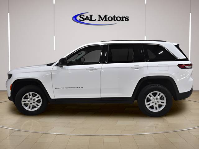 View vehicle photo 3