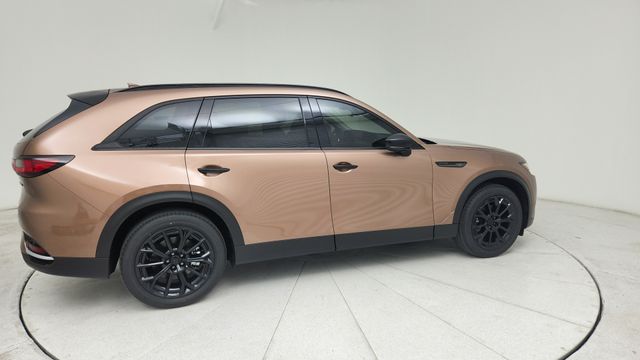New Melting Copper Metallic 2026 Mazda 3.3 Turbo Premium AWD for