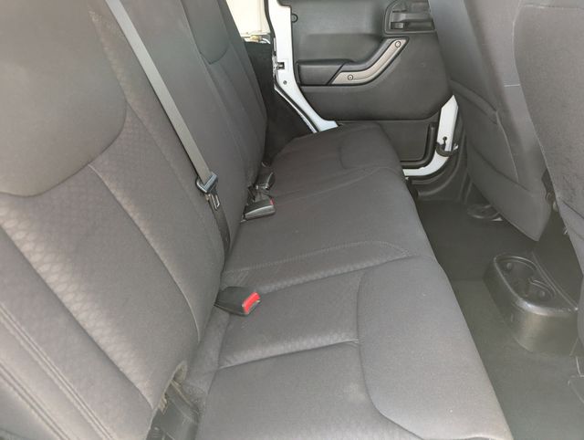 Used 2013 Bright White Clearcoat Jeep Unlimited Sport image 12