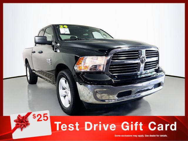 Diamond Black Crystal Pearlcoat 2024 RAM 1500 Classic SLT Quad Cab RWD Pickup Truck 4X2 8-Speed Automatic
