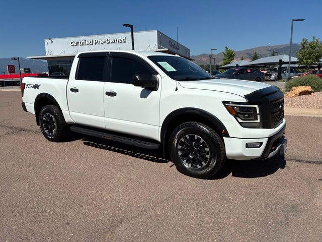 Glacier White 2021 Nissan Titan Pickup Truck Four-Wheel Drive 9-Speed Automatic